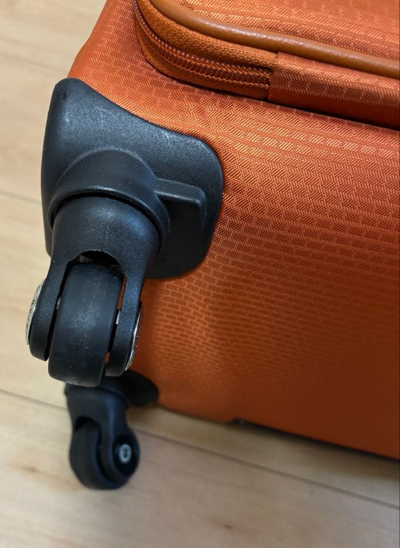 プロテカ　オレンジ キャリーケース 4輪 前面ポケット付き