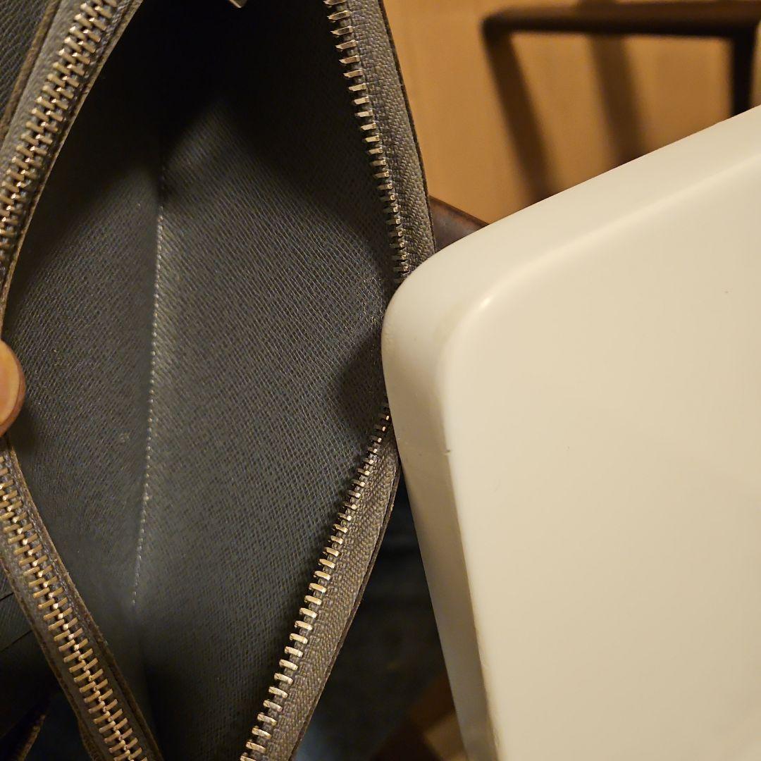 ルイヴィトン タイガ ジッピーウォレット ヴェルティカル 長財布 メンズ