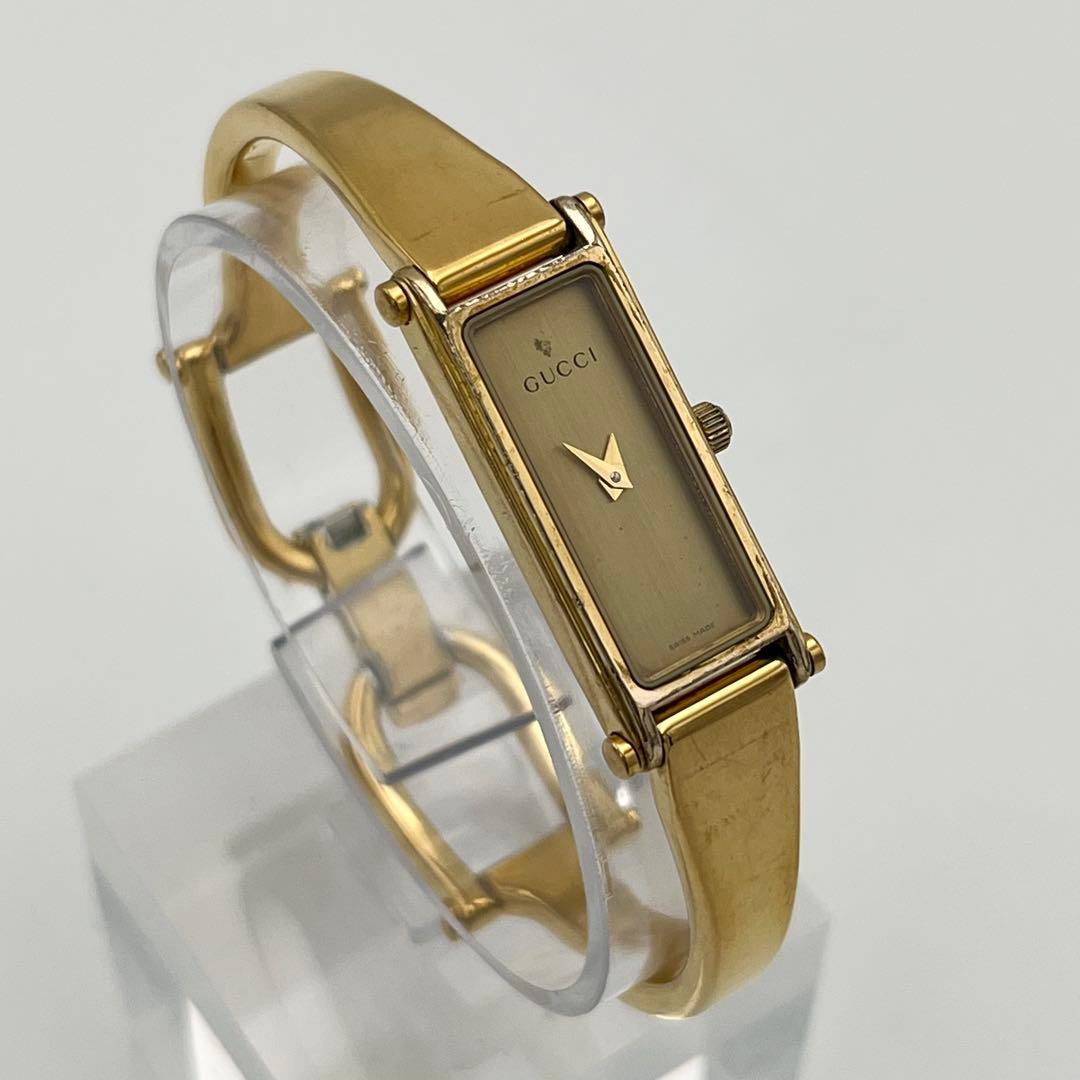 新品電池 GUCCI 1500L ゴールド文字盤 ベゼル バングルウォッチ 時計