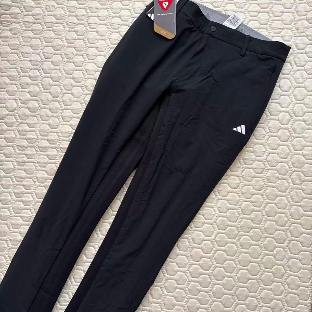 88新品27500円アディダスゴルフ/メンズ/秋冬/中綿ストレッチパンツ/黒BK