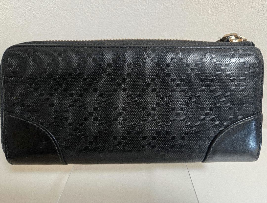 【今週末限定5,000円OFF！】GUCCI シマ/型 押し レザー長財布