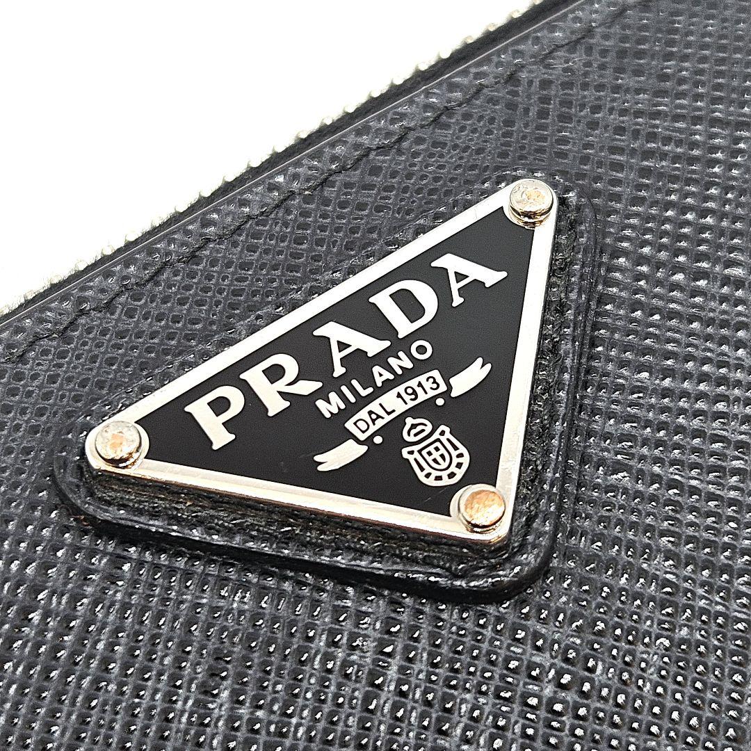 PRADA 折り財布 三角ロゴ サフィアーノ レザー ブラック ジップ