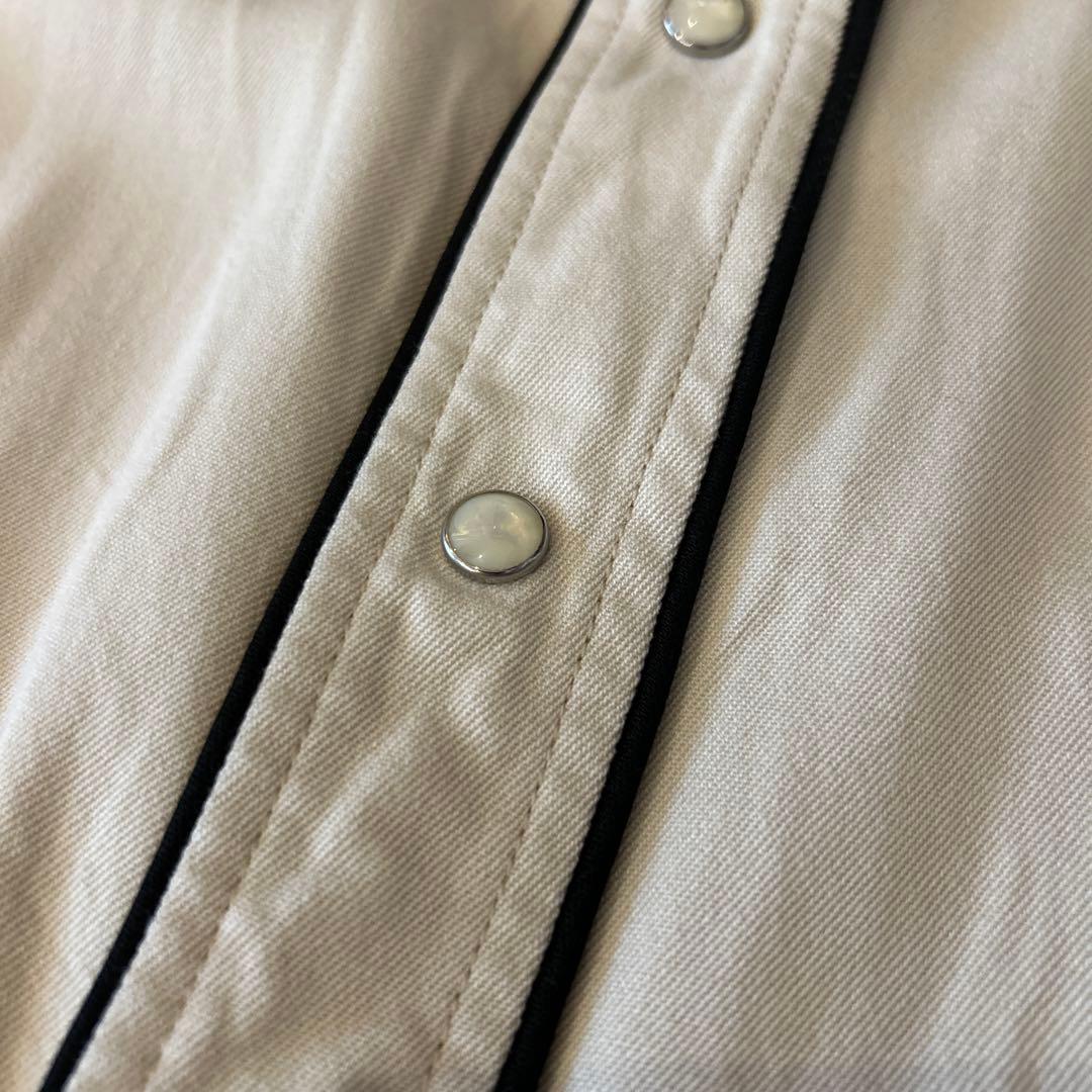 トップス The letters Western smile pocket Msize