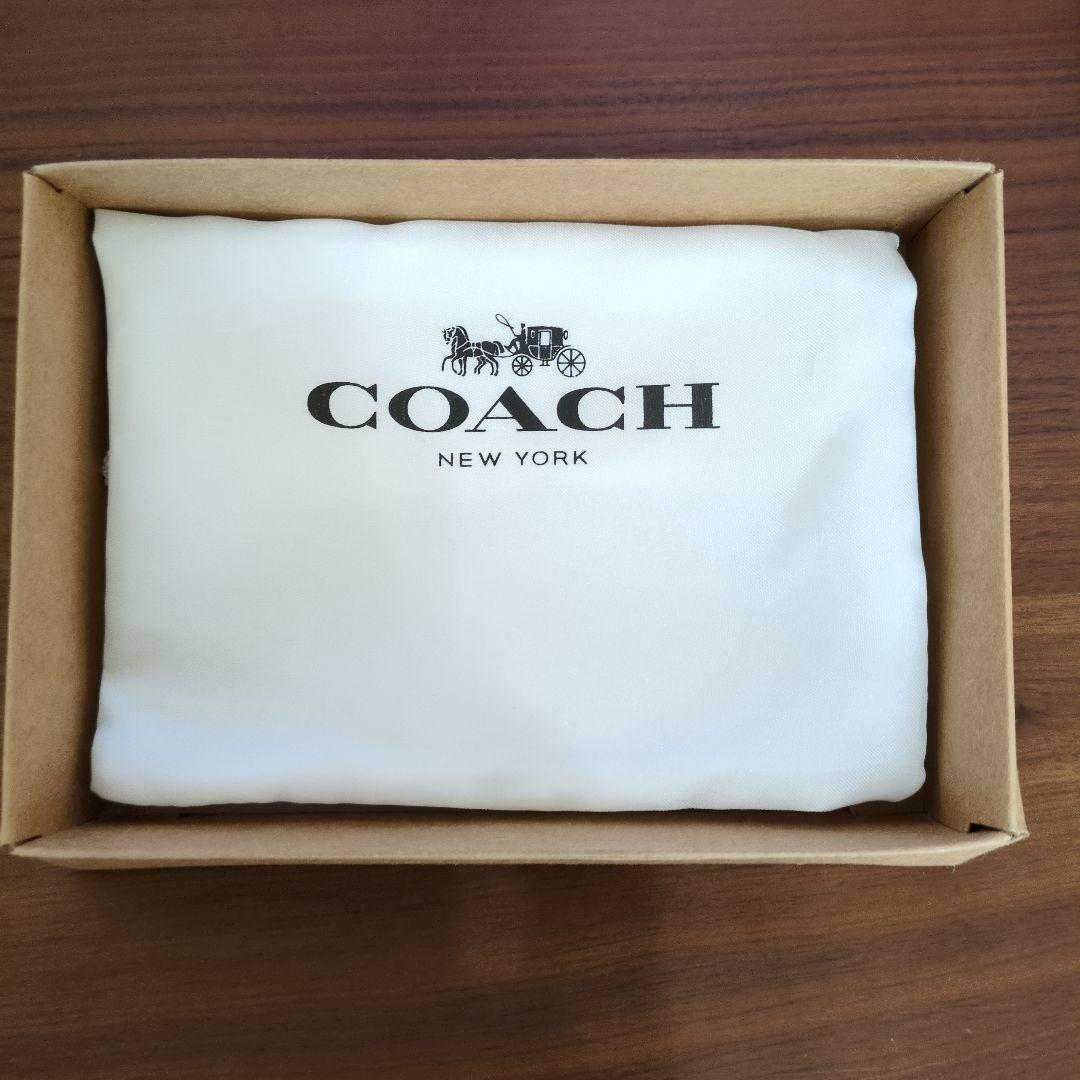m*u様 COACH 花柄 二つ折り財布