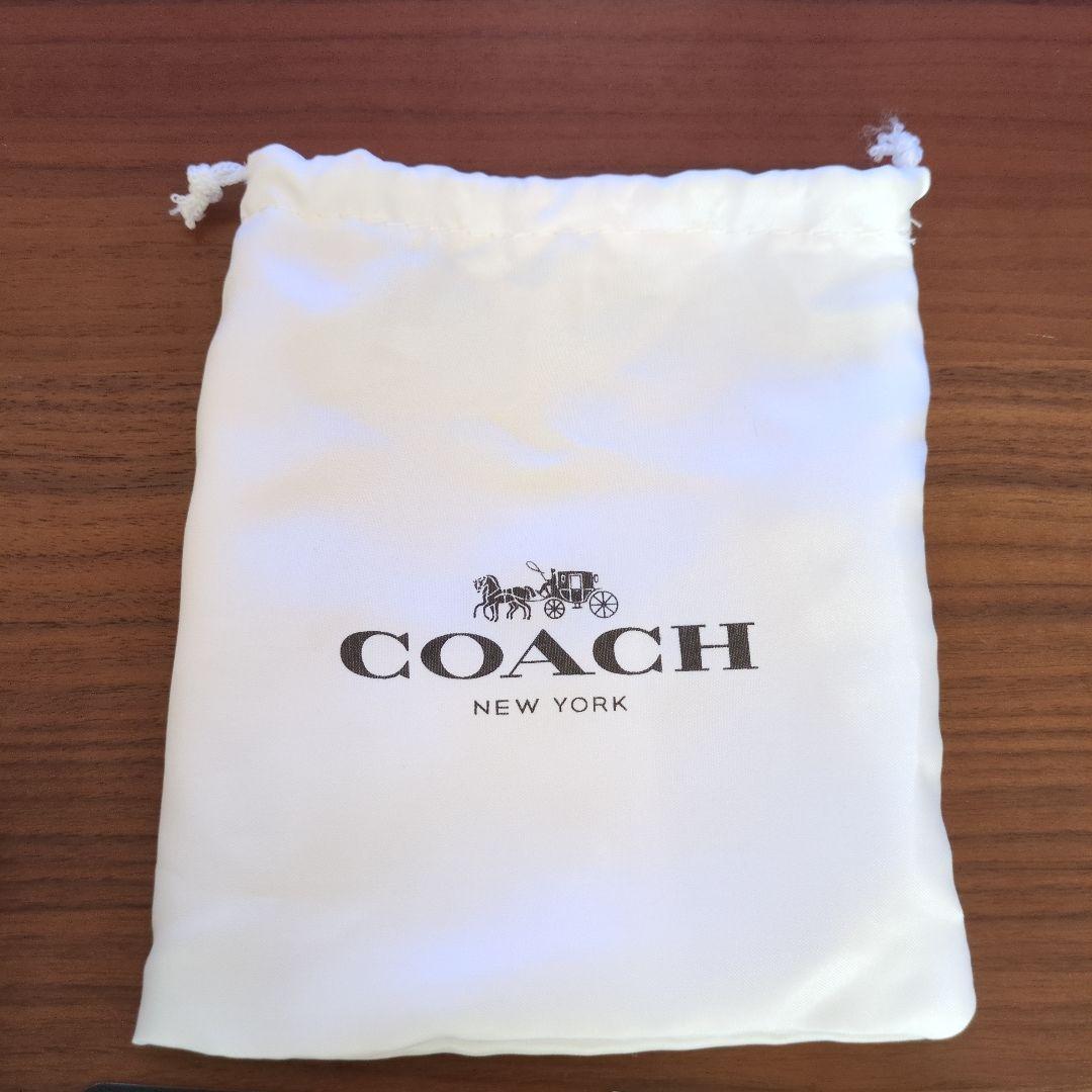 m*u様 COACH 花柄 二つ折り財布