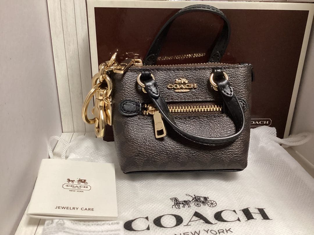 保存袋付未使用美品コーチCOACH ダークブラウン ミニバッグ型キーホルダー本物