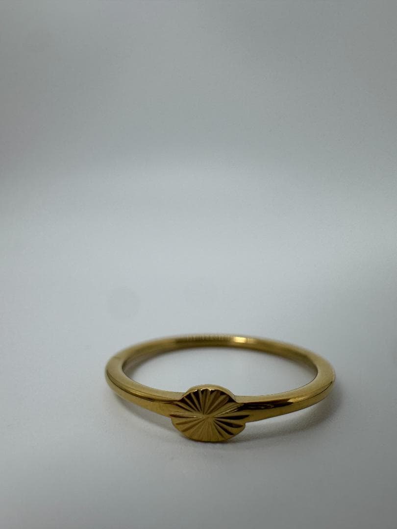 K18ゴールドリング 放射状彫刻0.71g/11号