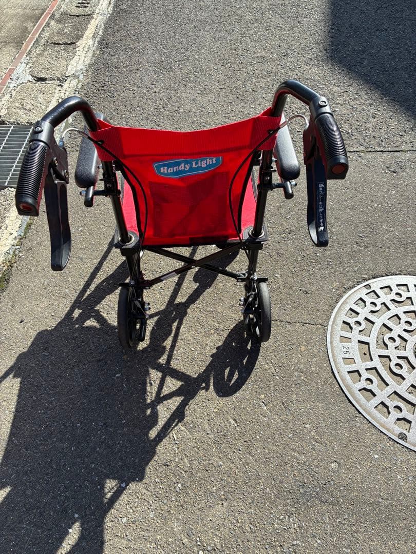 携帯型介助用簡易車イス、Handy Light