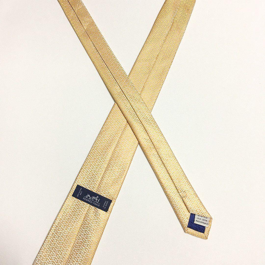 未使用級 エルメス HERMES ネクタイ シルク100% オレンジ系 総柄