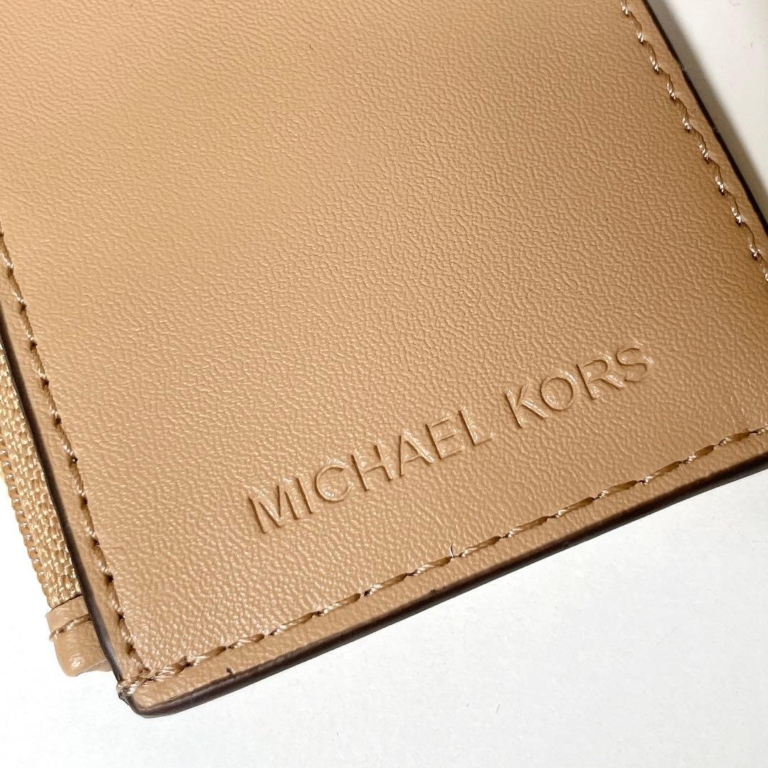 ちょっぴり大人なミニ財布✨MICHAEL KORS カルメン 二つ折り財布