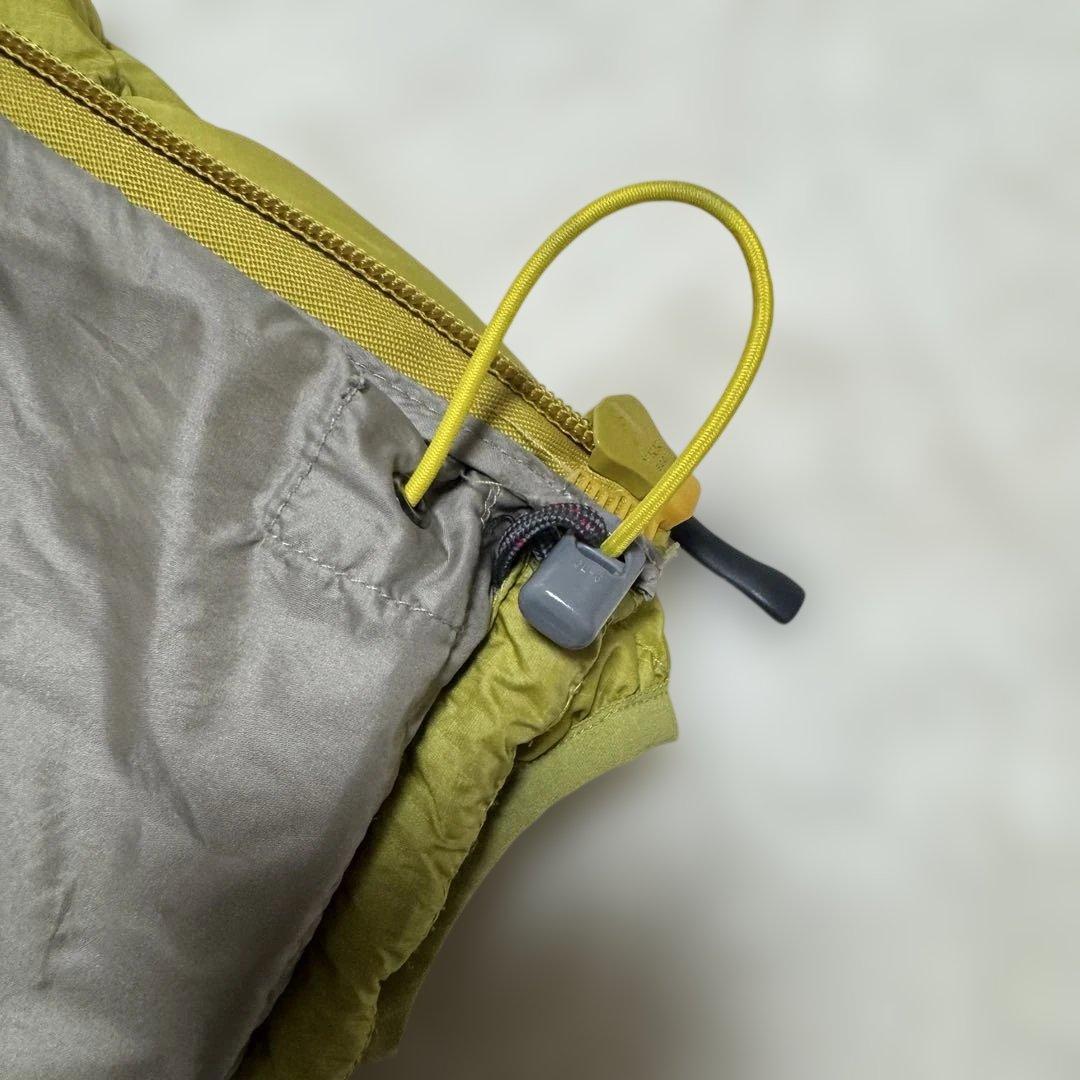 美品モンベル800FP ライトアルパインダウンパーカ Mイエローy2k短丈