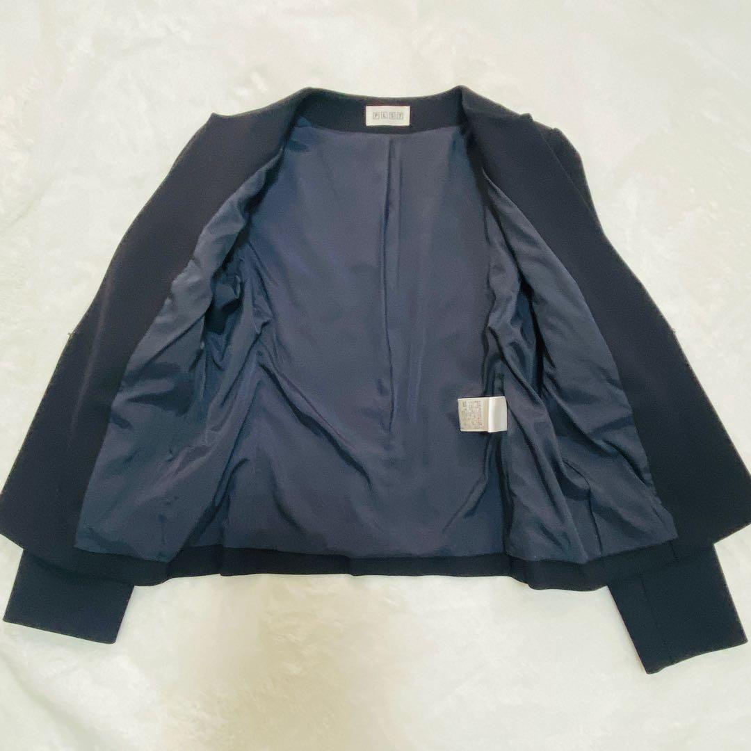 プラステ ノーカラージャケット パンツスーツ セットアップ ネイビー 上M下L