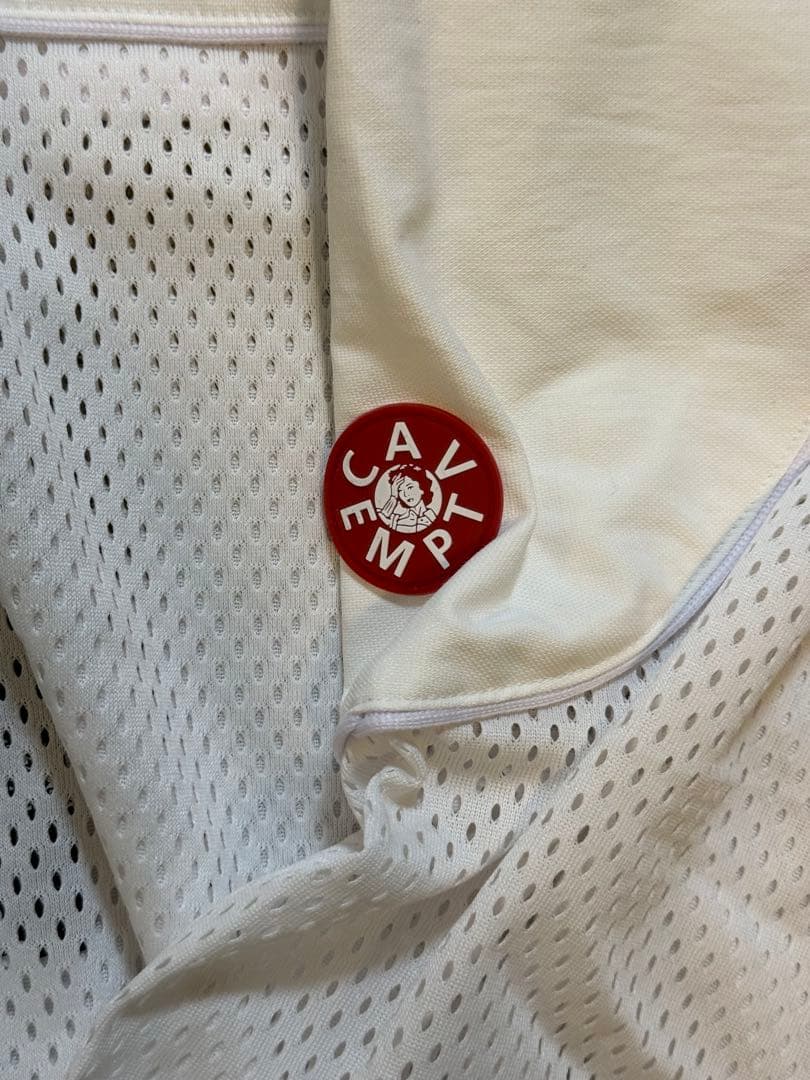 トップス C.E (Cav Empt) MESH TRACK CREW NECK