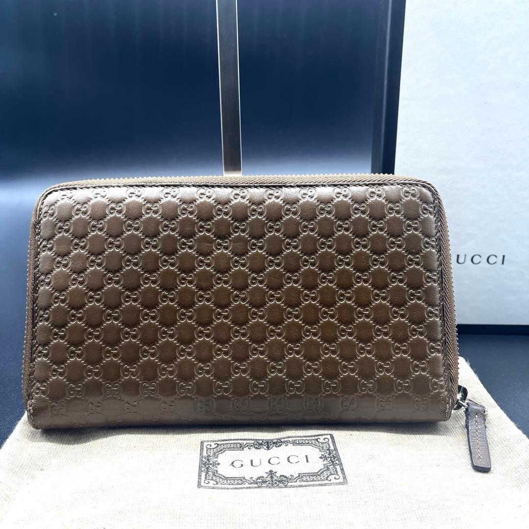 グッチ 長財布 オーガナイザー ラウンドファスナー マイクロシマ GG柄 茶