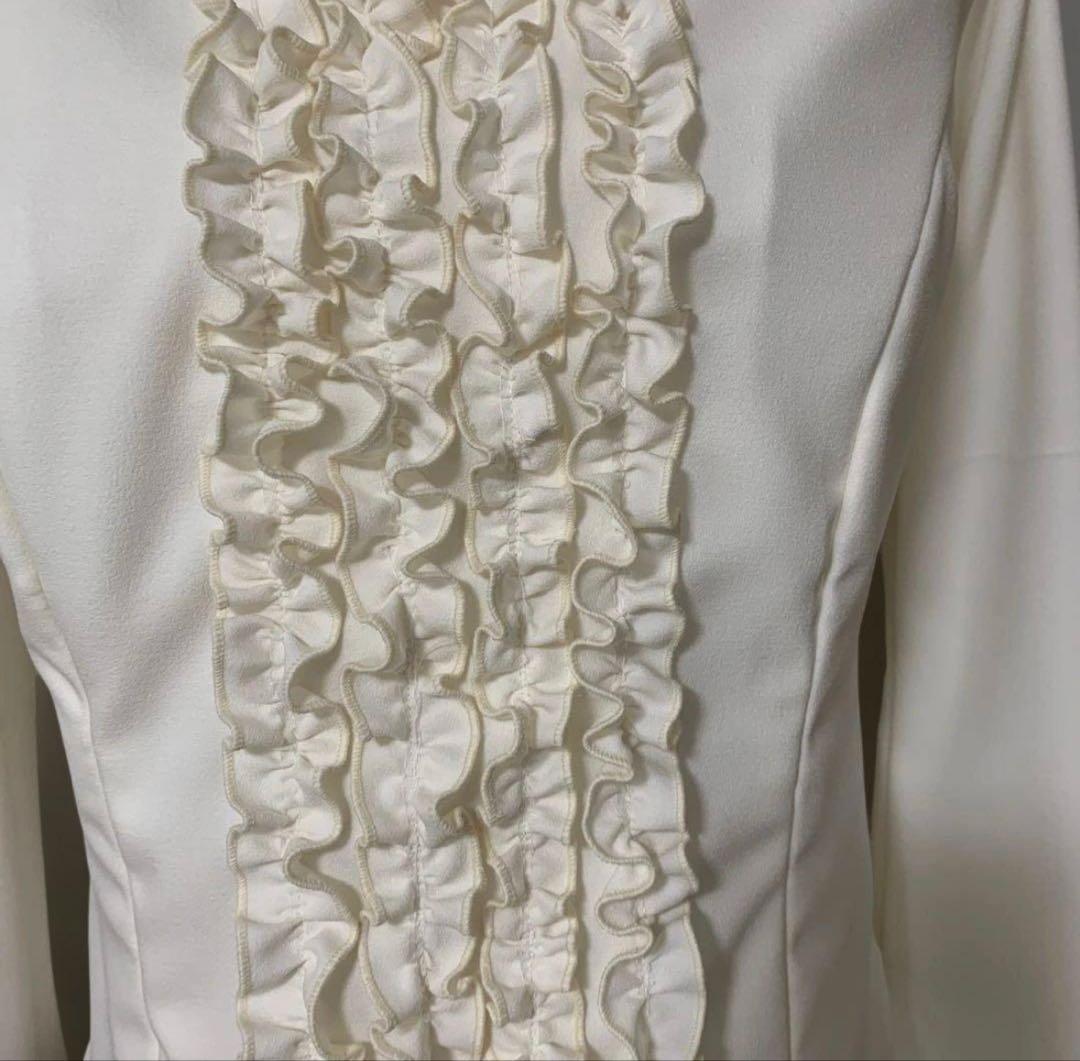 【新品未使用】フラメンコブラウス値下　アイボリーオフホワイト