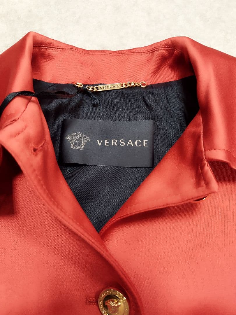 VERSACE ヴェルサーチ　オレンジ系　メデューサボタン柄　36