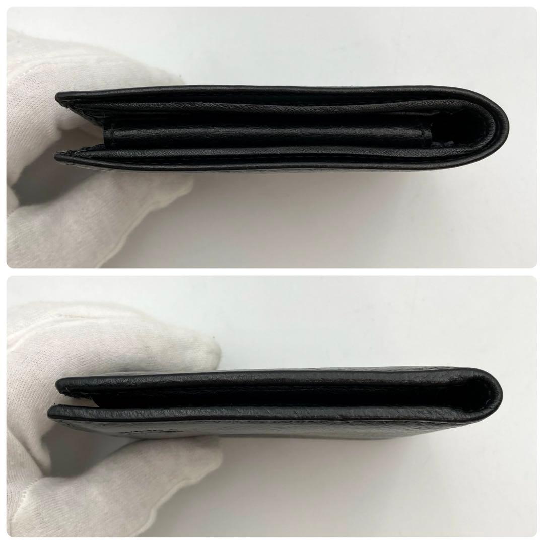 てんてん✨ IL BISONTE 二つ折り財布 黒 レザー ロゴ型押し