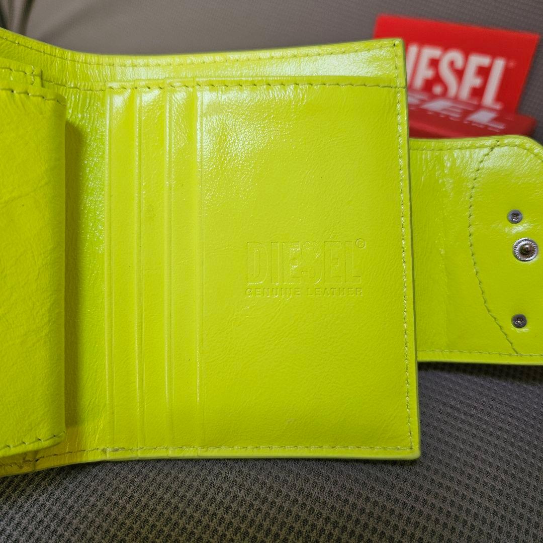 DIESEL ワンダーカミール 2つ折り財布 黄色 コンパクトウォレット 訳あり