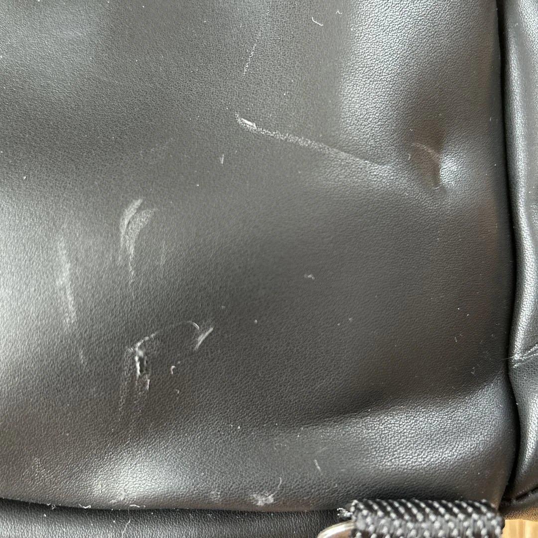 TUMI 232399DLブラックボディバッグ・ウエストポーチ