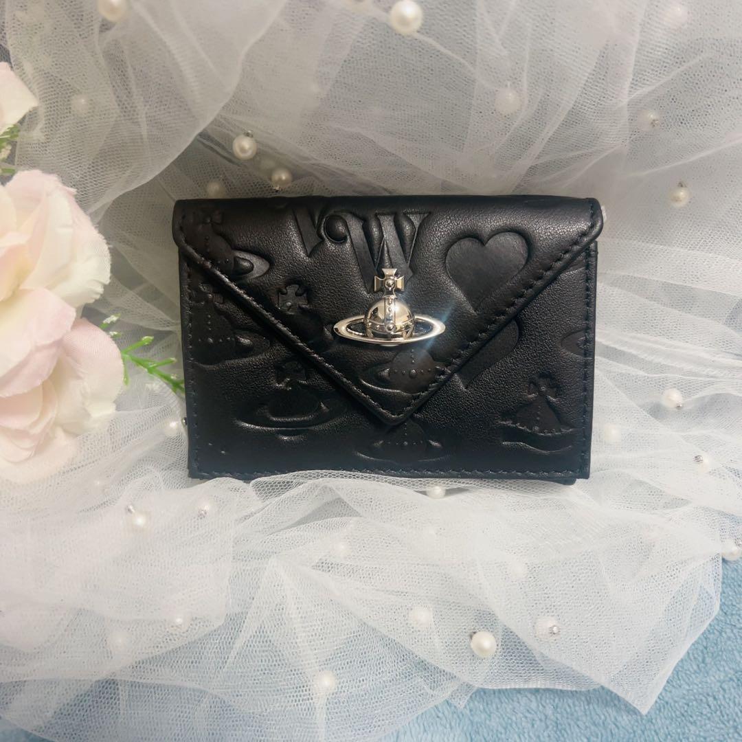 VivienneWestwood黒いエンボス三つ折り財布
