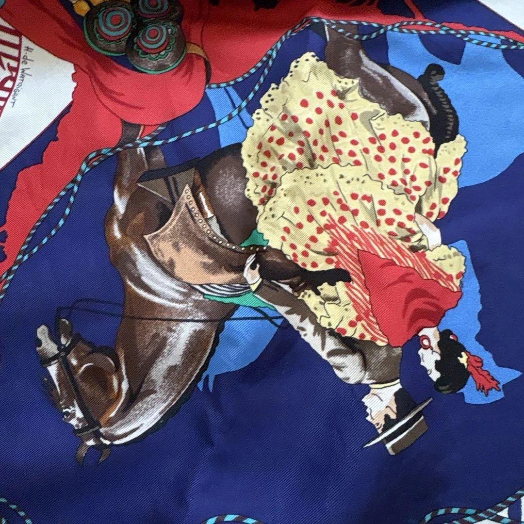 エルメスのシルクのスカーフです。 馬と騎手デザインです。