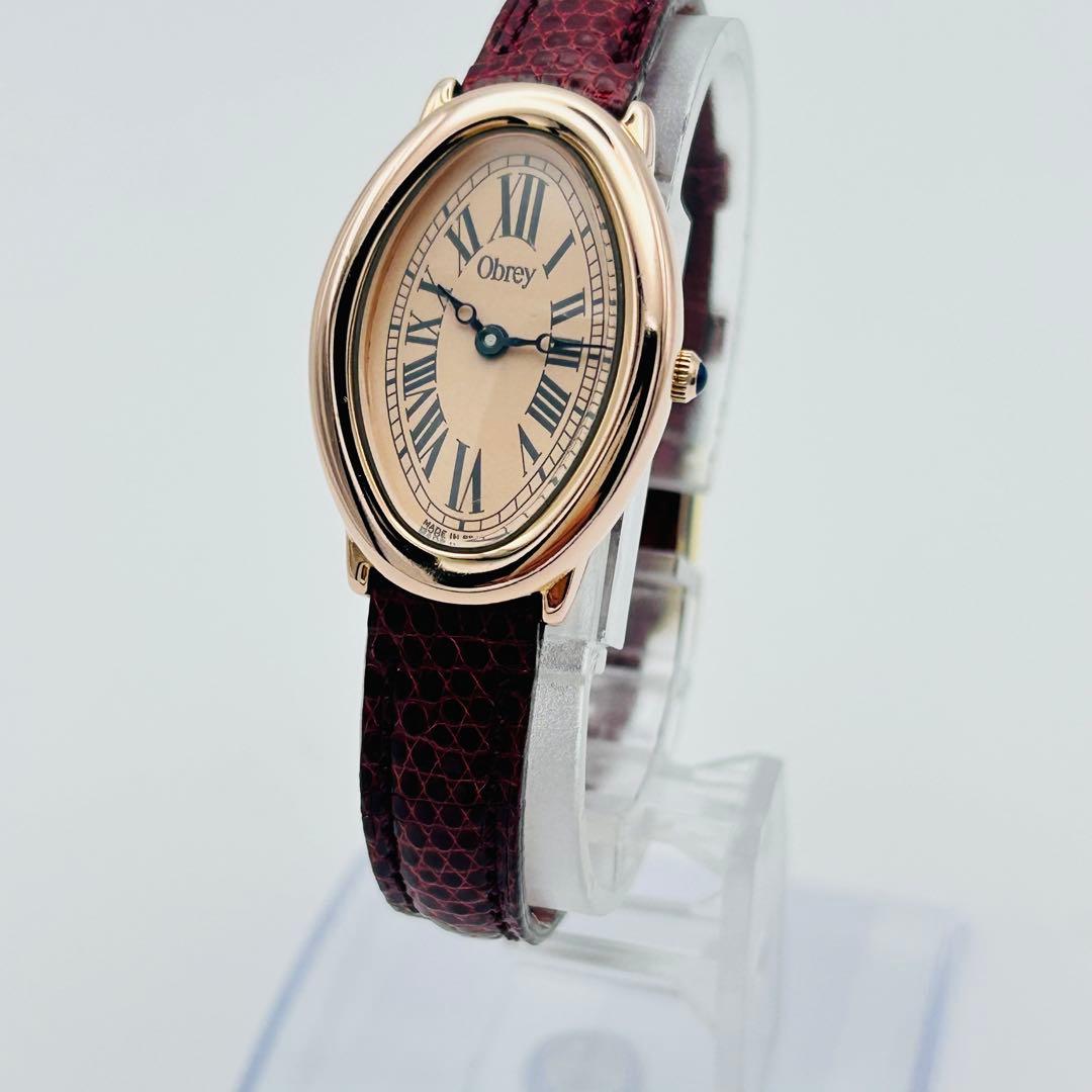 美品 希少 オブレイ ピンク文字盤 新品電池 ゴールド オーバル 腕時計