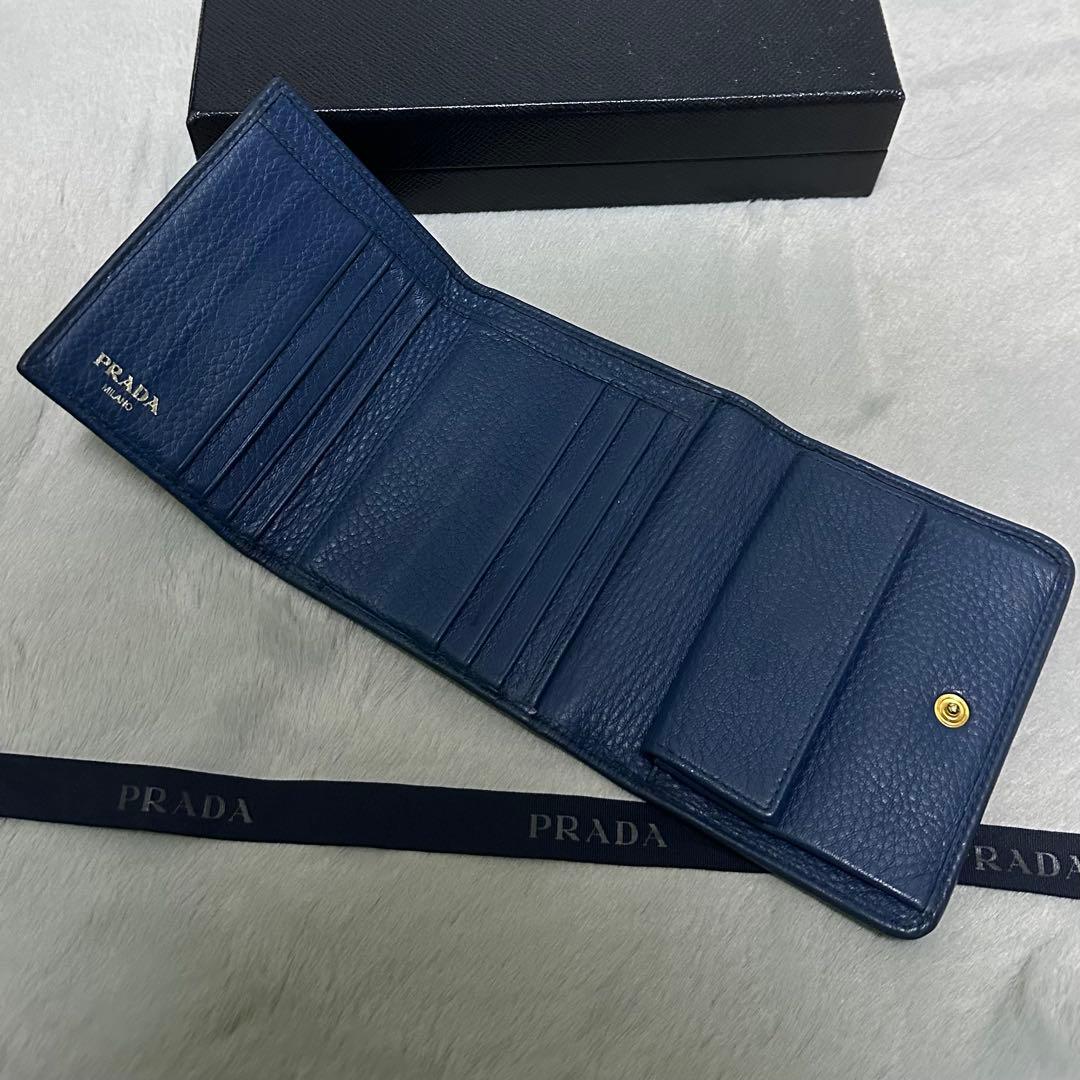 PRADA プラダ　折り財布　ゴールドロゴ　ブルー　シボ革