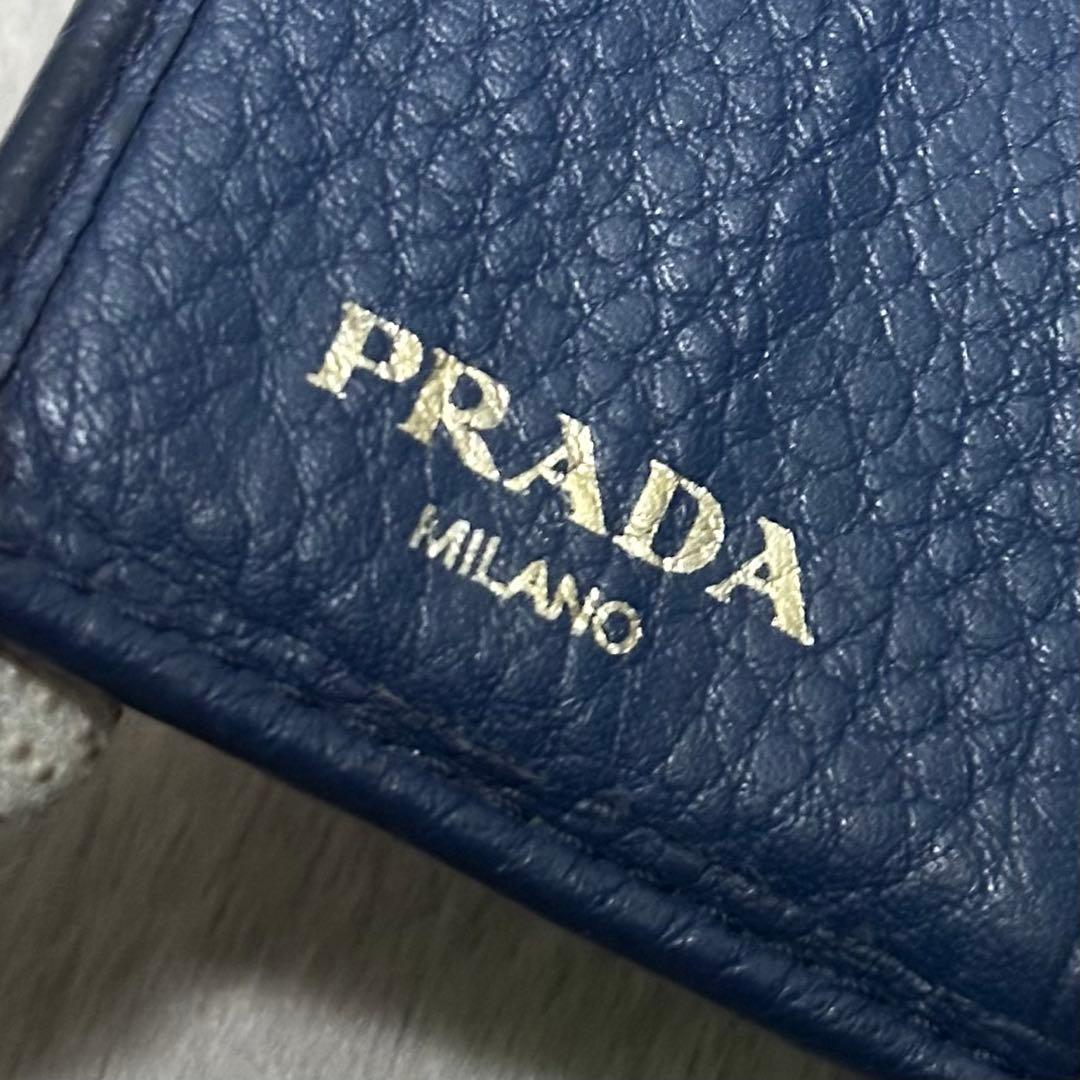 PRADA プラダ　折り財布　ゴールドロゴ　ブルー　シボ革