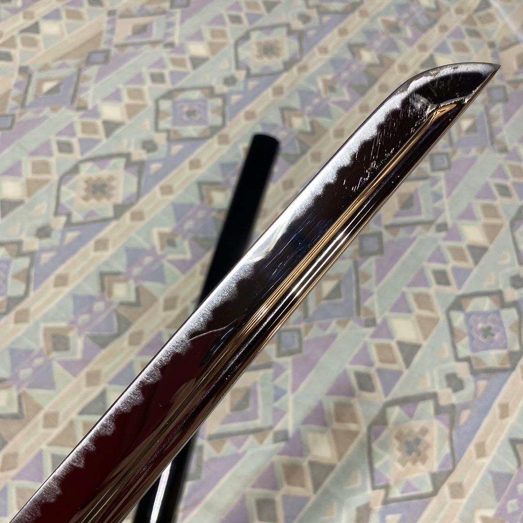 上級居合刀 黒柄 鶴波図楕円鍔 黒呂鞘