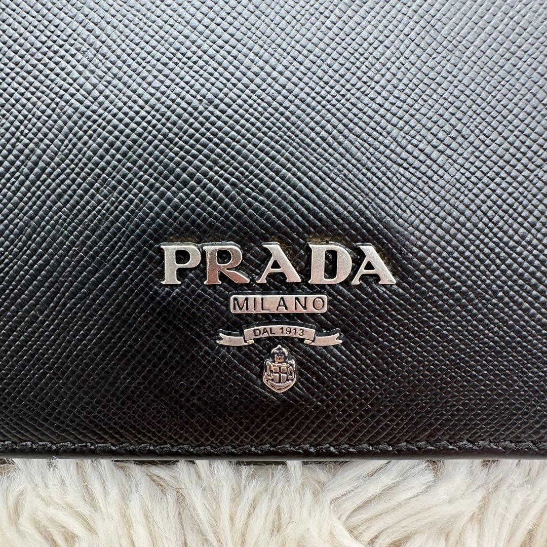 ✨美品✨プラダ　長財布　メタルロゴ　バイカラー　サフィアーノレザー　黒　赤