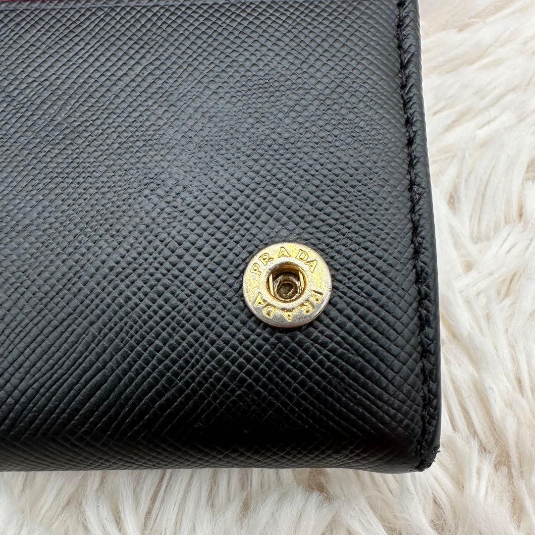 ✨美品✨プラダ　長財布　メタルロゴ　バイカラー　サフィアーノレザー　黒　赤